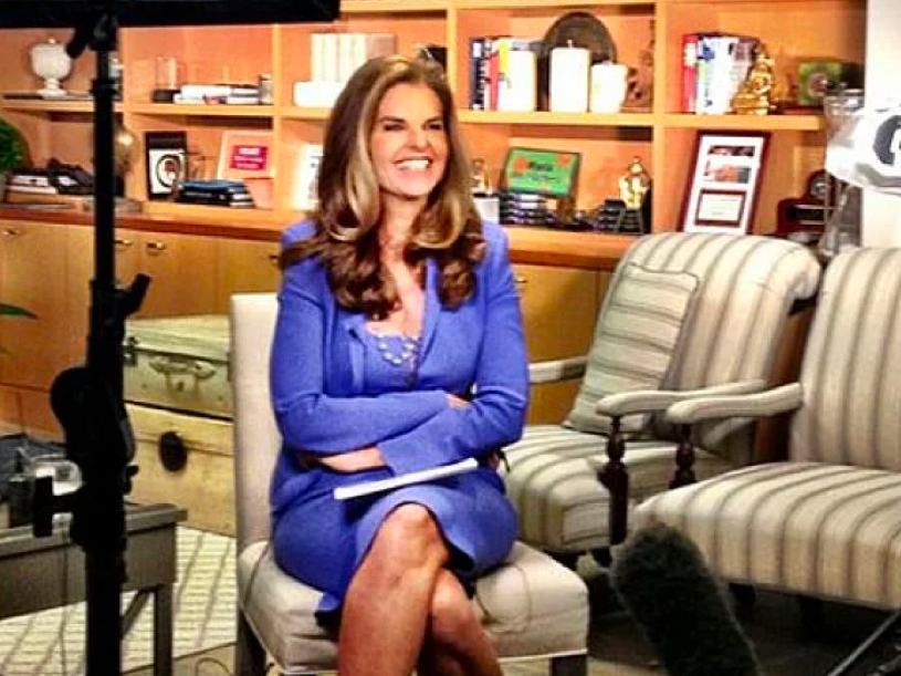 Maria Shriver behind the set of a reporting segment